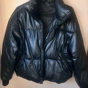 Black Puffer Jacket with High Collar and Sleek Design